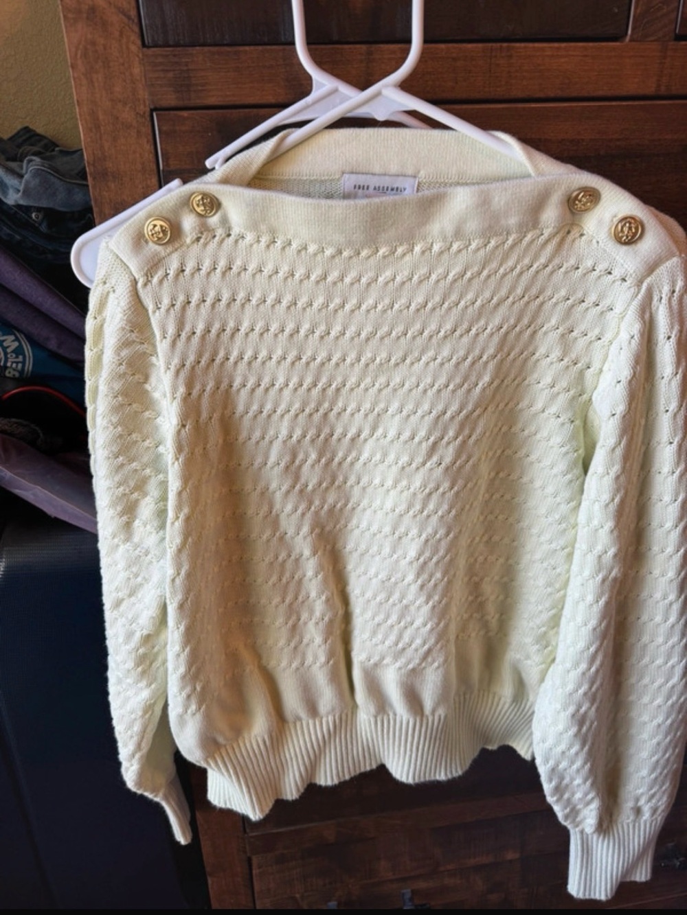 Textured Crewneck Sweater with Gold Shoulder Buttons in Light Cream